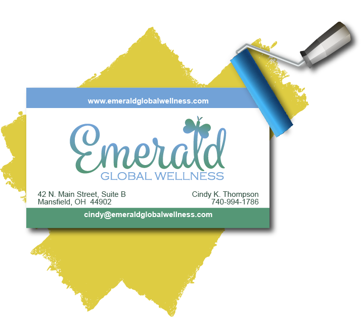 Emerald Global Wellness business card on an artistic background
